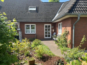 Nord-Ostsee-Nest - FeWo mit Sonnenterrasse und Wallbox, Tarp